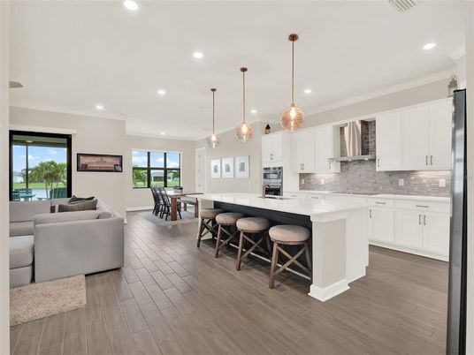 Dining room, Interior, Kitchen, Living room, Pendant Lights, Recessed Lighting, Stainless Steel Appliances, Wood Texture Flooring