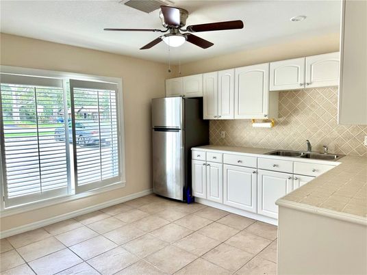 Interior, Kitchen, Recessed Lighting, Tile Countertops