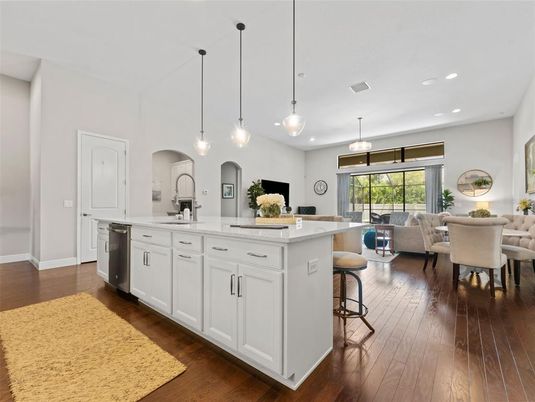 Dining room, Interior, Kitchen, Living room, Pendant Lights, Recessed Lighting, Stainless Steel Appliances, Wood Texture Flooring