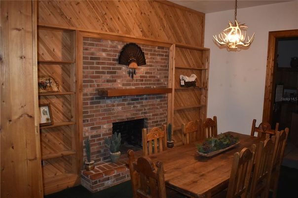 Dining room, Fireplace, Interior, Pendant Lights, Stone Walls