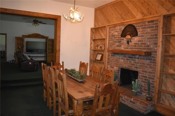 Dining room, Fireplace, Interior, Pendant Lights, Stone Walls