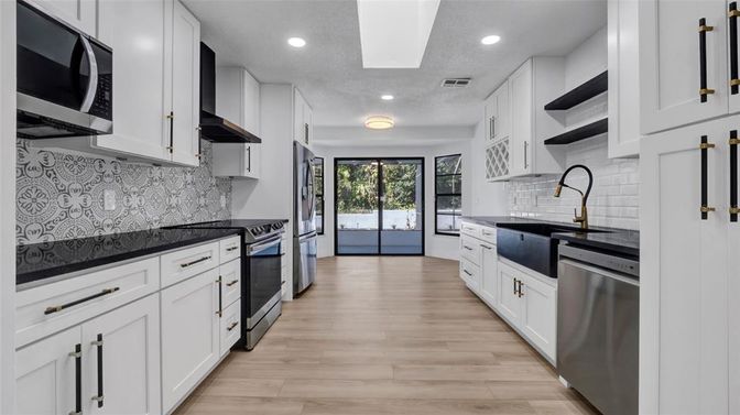 Interior, Kitchen, Recessed Lighting, Stainless Steel Appliances, Wood Texture Flooring