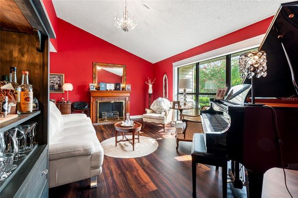 Chandelier, Fireplace, Interior, Living room, Piano, Wood Texture Flooring