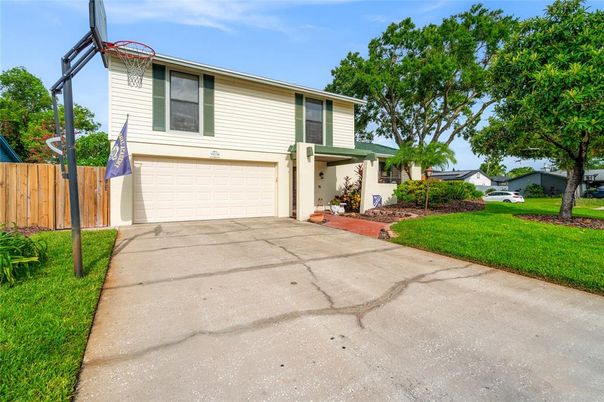 Attached, Exterior, Facade, Raised Ranch