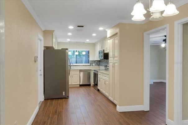 Interior, Kitchen, Pendant Lights, Recessed Lighting, Stainless Steel Appliances, Wood Texture Flooring