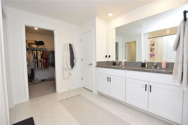 Bathroom, Dual Sink Vanities, Interior, Recessed Lighting, Walk-in Closets