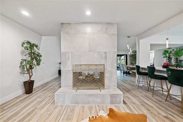 Dining room, Fireplace, Interior, Pendant Lights, Recessed Lighting, Wood Texture Flooring