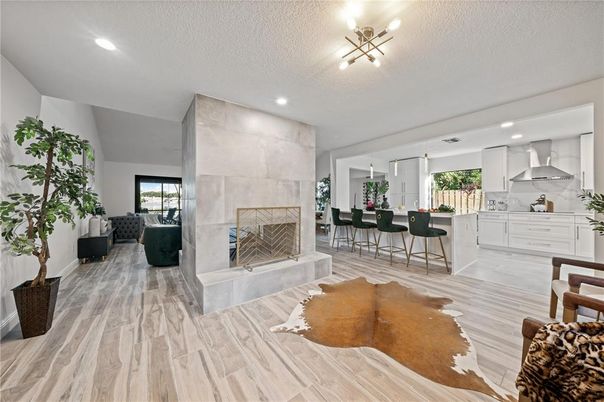 Fireplace, Interior, Kitchen, Recessed Lighting, Wood Texture Flooring