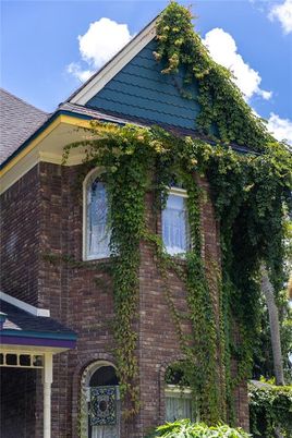 Attached, Exterior, Facade, Brick Facade, None