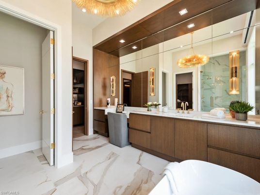 Bathroom, Dual Sink Vanities, Free Standing Baths, Interior, Marble, Pendant Lights, Recessed Lighting