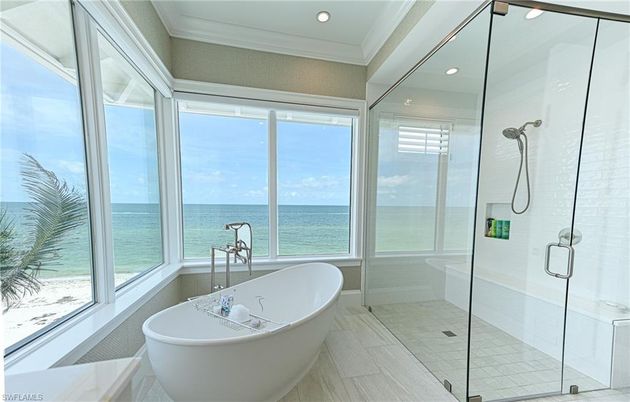 Bathroom, Free Standing Baths, Glass Shower, Interior, Recessed Lighting, Water, Wood Texture Flooring