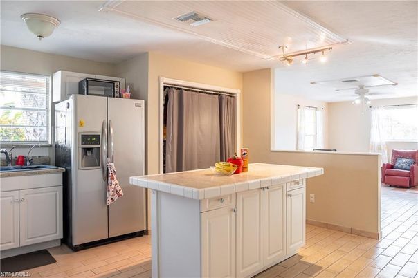 Interior, Kitchen, Tile Countertops, Wood Texture Flooring