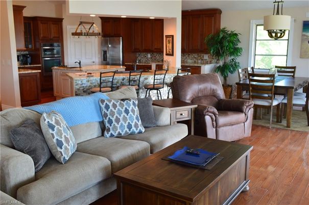 Dining room, Interior, Kitchen, Living room, Pendant Lights, Recessed Lighting, Stainless Steel Appliances, Wood Texture Flooring