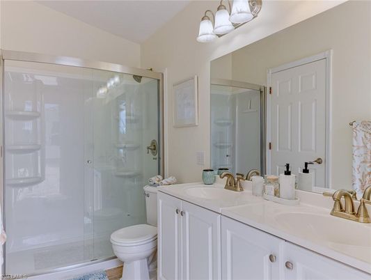 Bathroom, Dual Sink Vanities, Glass Shower, Interior, Wood Texture Flooring