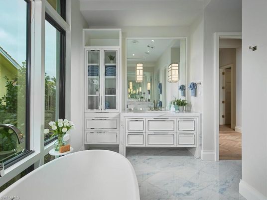 Bathroom, Dual Sink Vanities, Free Standing Baths, Interior, Marble, Recessed Lighting