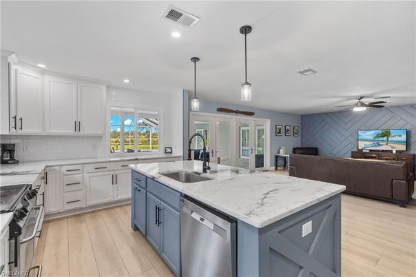 Interior, Kitchen, Pendant Lights, Recessed Lighting, Stainless Steel Appliances, Wood Texture Flooring