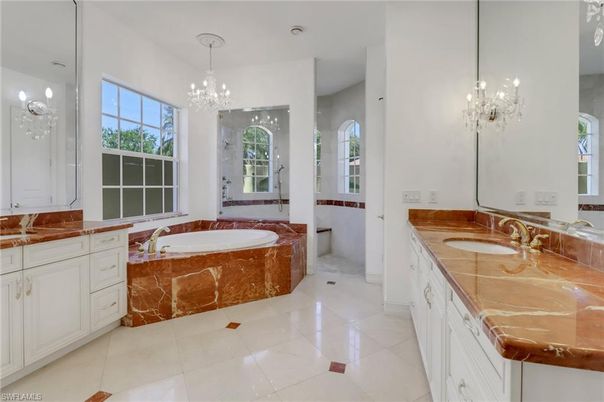 Bathroom, Chandelier, Dual Sink Vanities, Interior, Pendant Lights, Tile Countertops