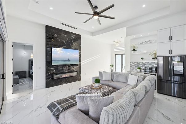 Fireplace, Interior, Kitchen, Living room, Marble, Pendant Lights, Recessed Lighting, Stainless Steel Appliances
