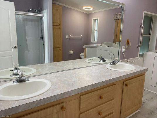 Bathroom, Dual Sink Vanities, Interior, Recessed Lighting, Wood Texture Flooring