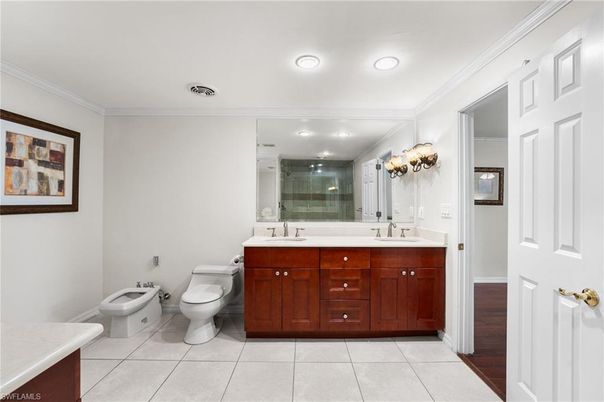 Bathroom, Dual Sink Vanities, Interior, Recessed Lighting, Wood Texture Flooring