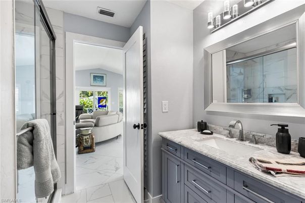 Bathroom, Dual Sink Vanities, Glass Shower, Interior, Marble, Marble Walls