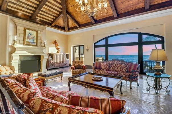 Chandelier, Fireplace, Interior, Living room, Recessed Lighting, Water, Wooden Beams, Wooden Ceilings, Wood Texture Flooring