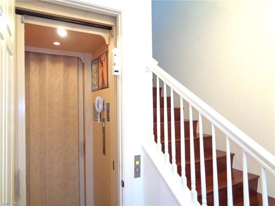 Elevator, Interior, Recessed Lighting, Wooden Walls