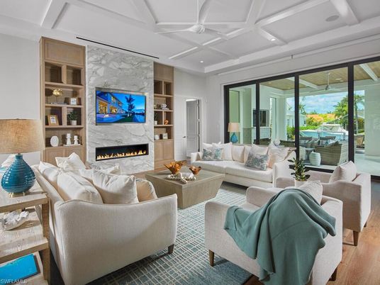 Fireplace, Interior, Living room, Recessed Lighting, Stone Walls, Wood Texture Flooring