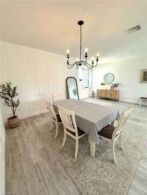 Chandelier, Dining room, Interior, Wood Texture Flooring