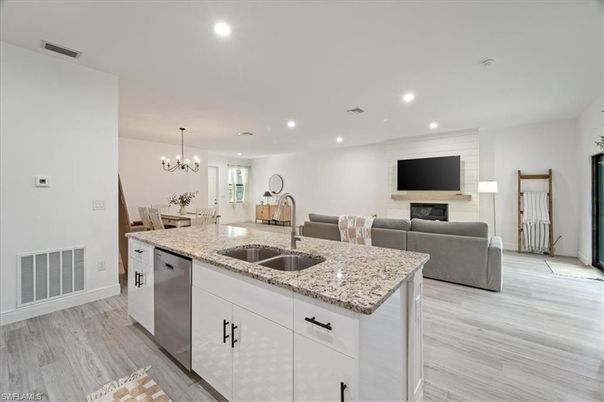 Chandelier, Dining room, Interior, Kitchen, Living room, Pendant Lights, Recessed Lighting, Wood Texture Flooring