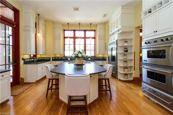 Dining room, Interior, Kitchen, Pendant Lights, Stainless Steel Appliances, Wood Texture Flooring