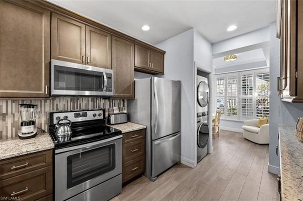Interior, Kitchen, Recessed Lighting, Stainless Steel Appliances, Washer, Wood Texture Flooring