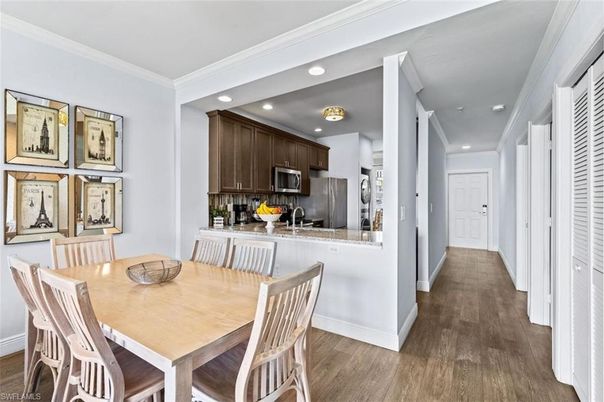 Dining room, Interior, Kitchen, Recessed Lighting, Stainless Steel Appliances, Wood Texture Flooring