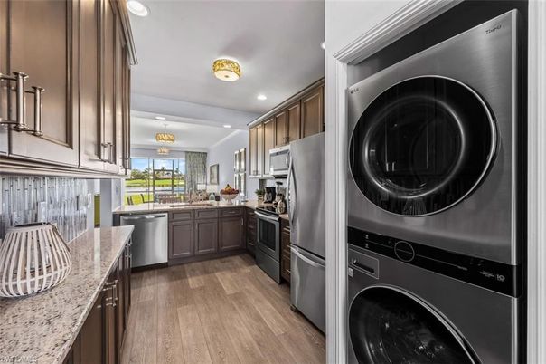 Interior, Kitchen, Recessed Lighting, Stainless Steel Appliances, Washer, Wood Texture Flooring