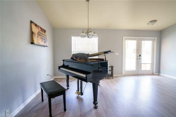 Interior, Pendant Lights, Piano, Wood Texture Flooring