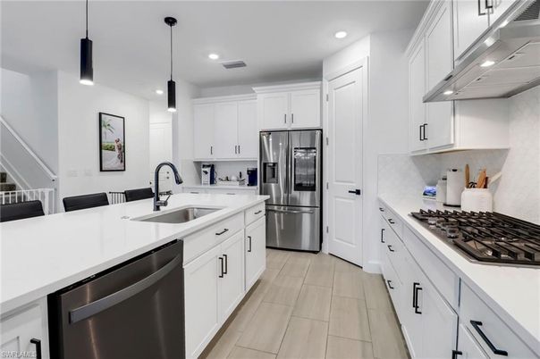 Interior, Kitchen, Pendant Lights, Recessed Lighting, Stainless Steel Appliances, Wood Texture Flooring