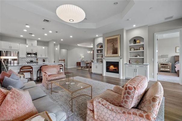 Dining room, Fireplace, Interior, Kitchen, Living room, Pendant Lights, Recessed Lighting, Stainless Steel Appliances, Wood Texture Flooring
