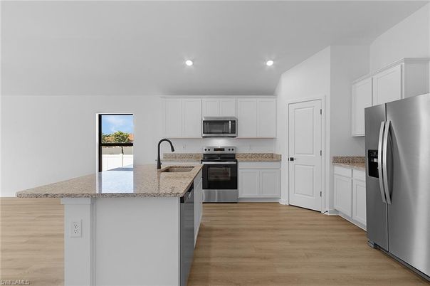 Interior, Kitchen, Recessed Lighting, Stainless Steel Appliances, Wood Texture Flooring