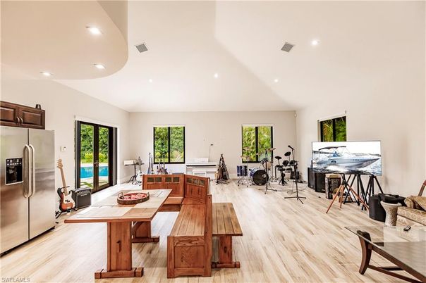 Fitness Equipment, Interior, Kitchen, Recessed Lighting, Stainless Steel Appliances, Wood Texture Flooring