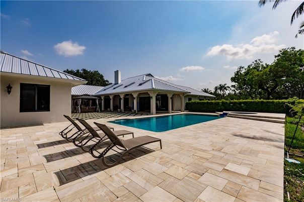 Exterior, Pool, Solar Panels