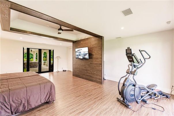 Bedroom, Fitness Equipment, Interior, Recessed Lighting, Wood Texture Flooring