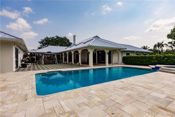 Exterior, Pool, Solar Panels