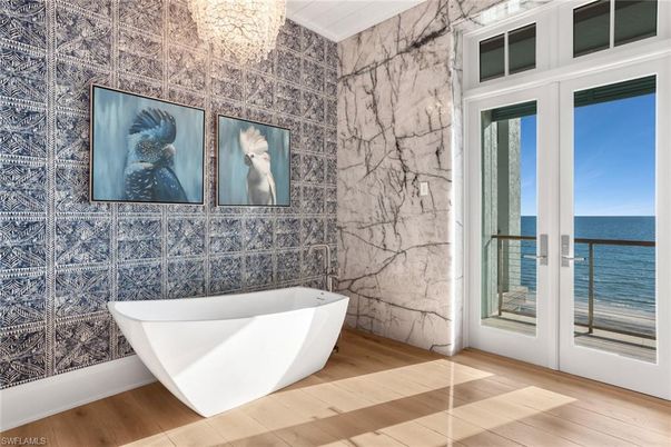Bathroom, Free Standing Baths, Interior, Marble Walls, Water, Wood Texture Flooring