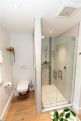 Bathroom, Glass Shower, Interior, Recessed Lighting, Wood Texture Flooring