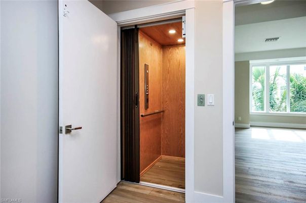 Elevator, Interior, Recessed Lighting, Wooden Ceilings, Wood Texture Flooring, Wooden Walls