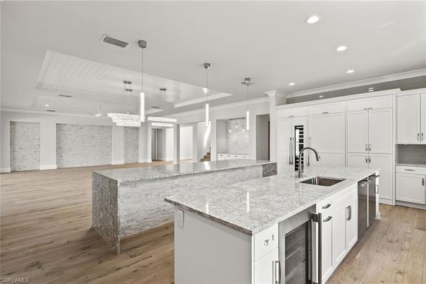 Chandelier, Interior, Kitchen, Pendant Lights, Recessed Lighting, Stainless Steel Appliances, Wood Texture Flooring