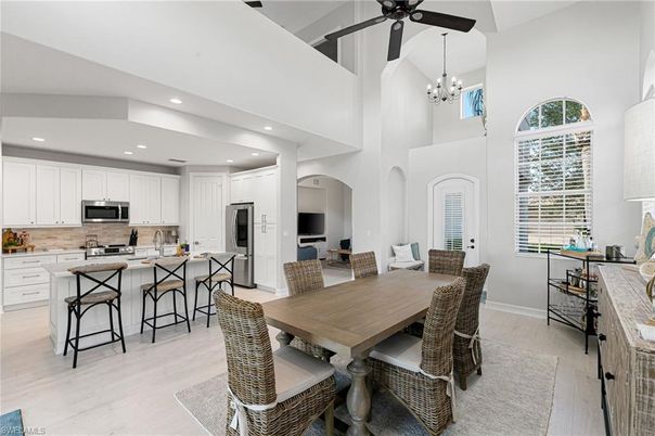Chandelier, Dining room, Interior, Kitchen, Pendant Lights, Recessed Lighting, Stainless Steel Appliances, Wood Texture Flooring