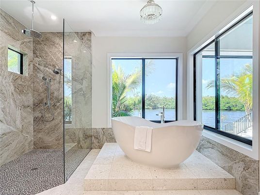 Bathroom, Free Standing Baths, Glass Shower, Interior, Marble Walls, Recessed Lighting