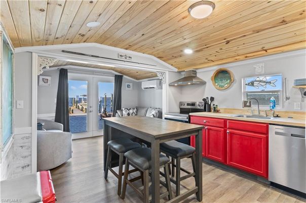 Dining room, Interior, Kitchen, Recessed Lighting, Stainless Steel Appliances, Wooden Ceilings, Wood Texture Flooring