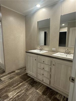 Bathroom, Dual Sink Vanities, Interior, Recessed Lighting, Wood Texture Flooring